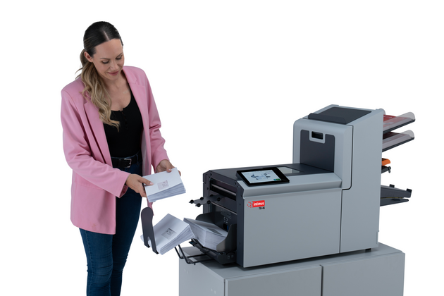 Intimus TSI-4G folder inserter in use, angled view