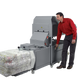 Compressed paper bale ejected from the Intimus 870 baler