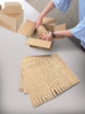PacMaster cardboard filler wrapped around a fragile item
