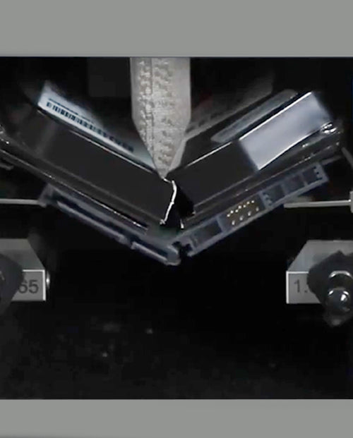 Intimus Hybrid crusher hardened V-shaped anvil bending a hard drive