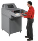 Operator feeding paper onto the Intimus 14.95 infeed conveyor