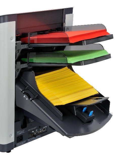 Intimus MaxiFeeder installed below the feed trays of a folder inserter (inserter shown, not included)