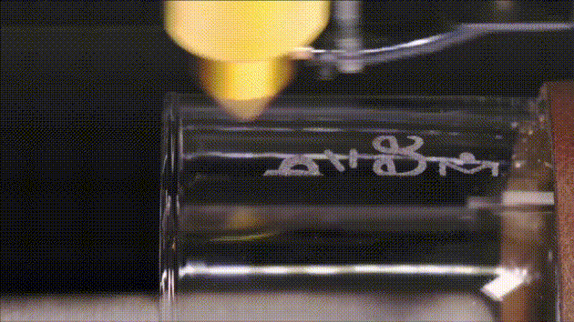 FLUX beamo rotary module engraving a cylindrical object